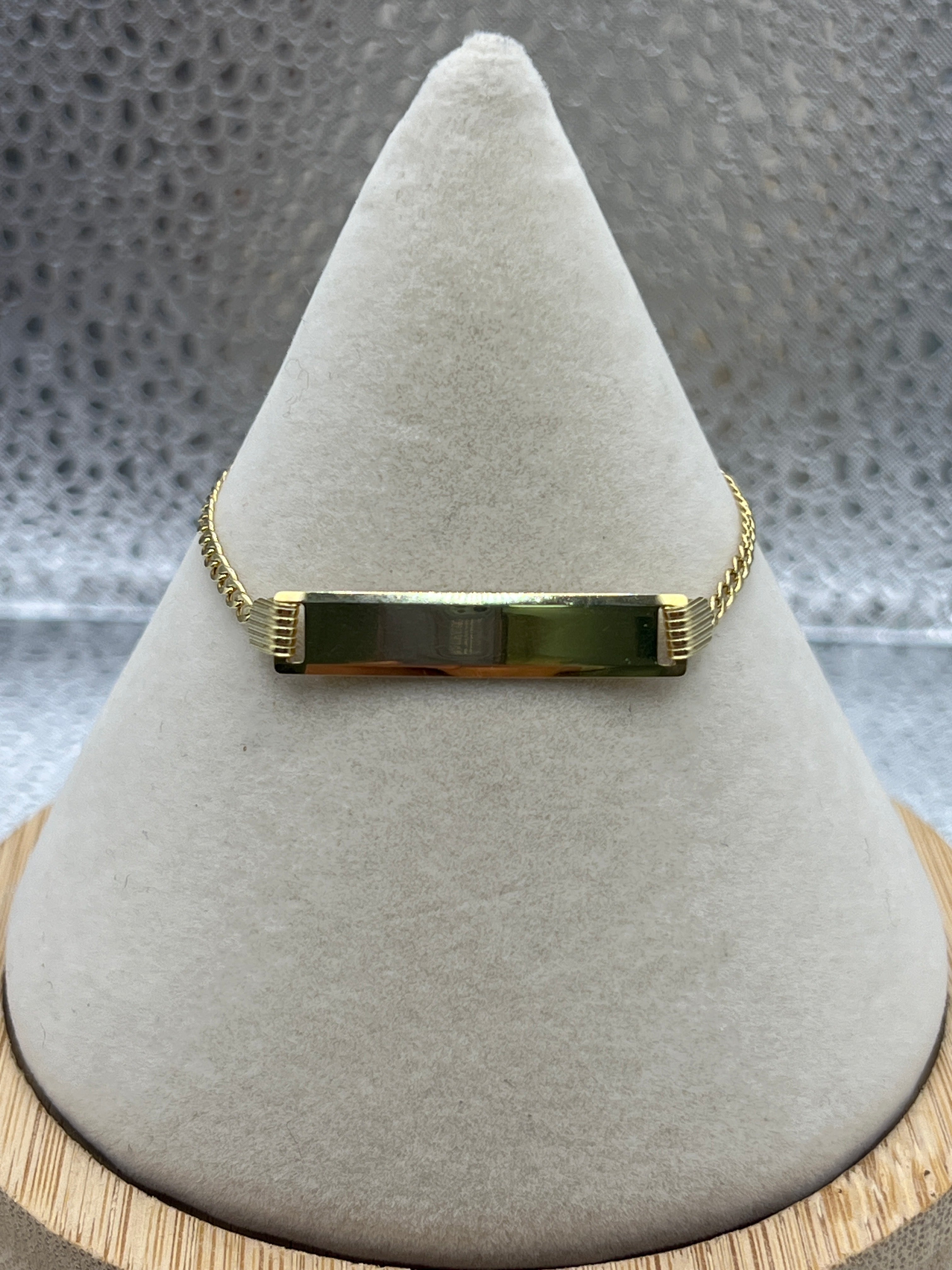 10k yellow gold Cuban plate bracelet, size “5.5” 2mm