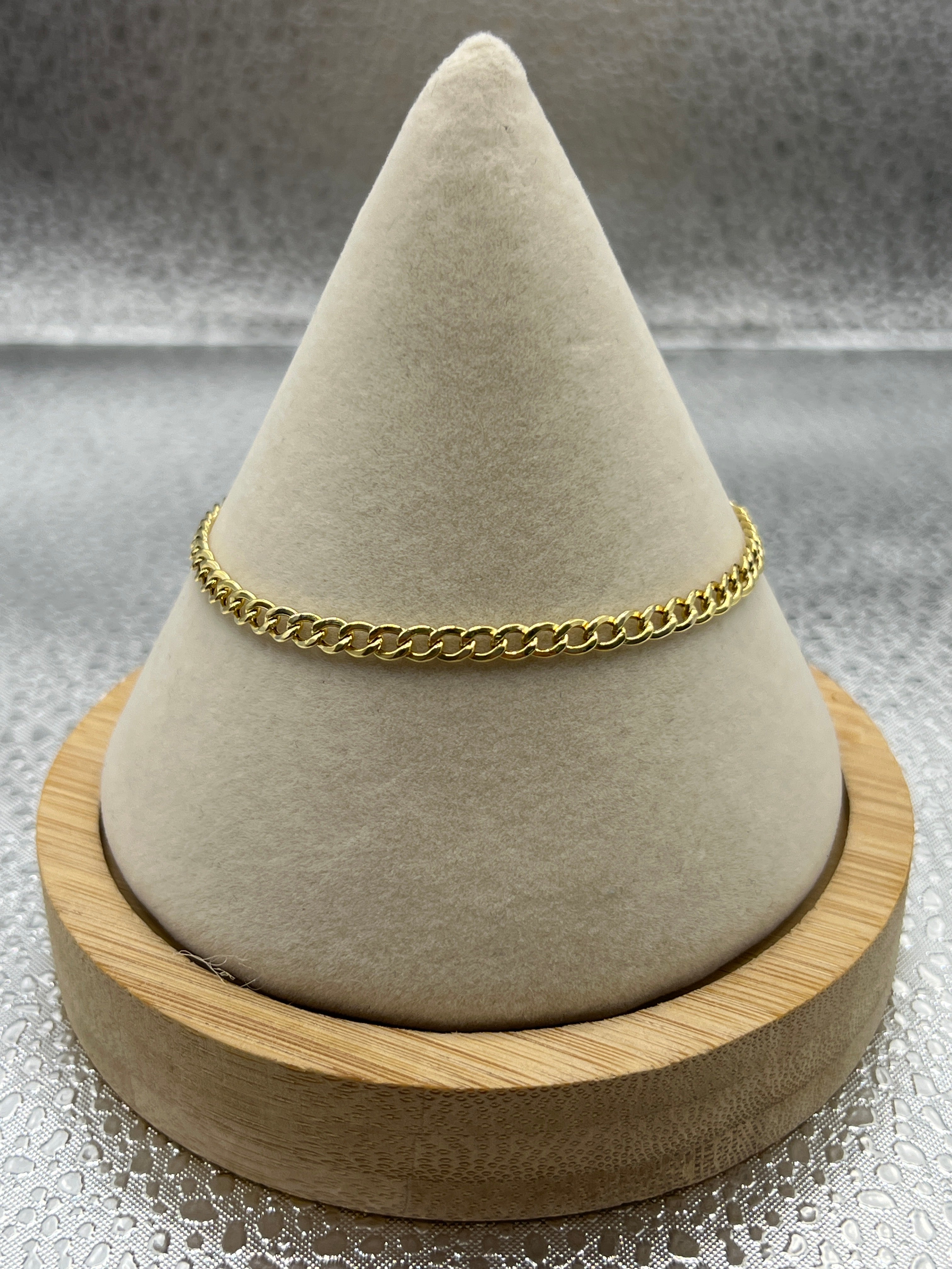 10k yellow gold “7” 3.3mm bracelet