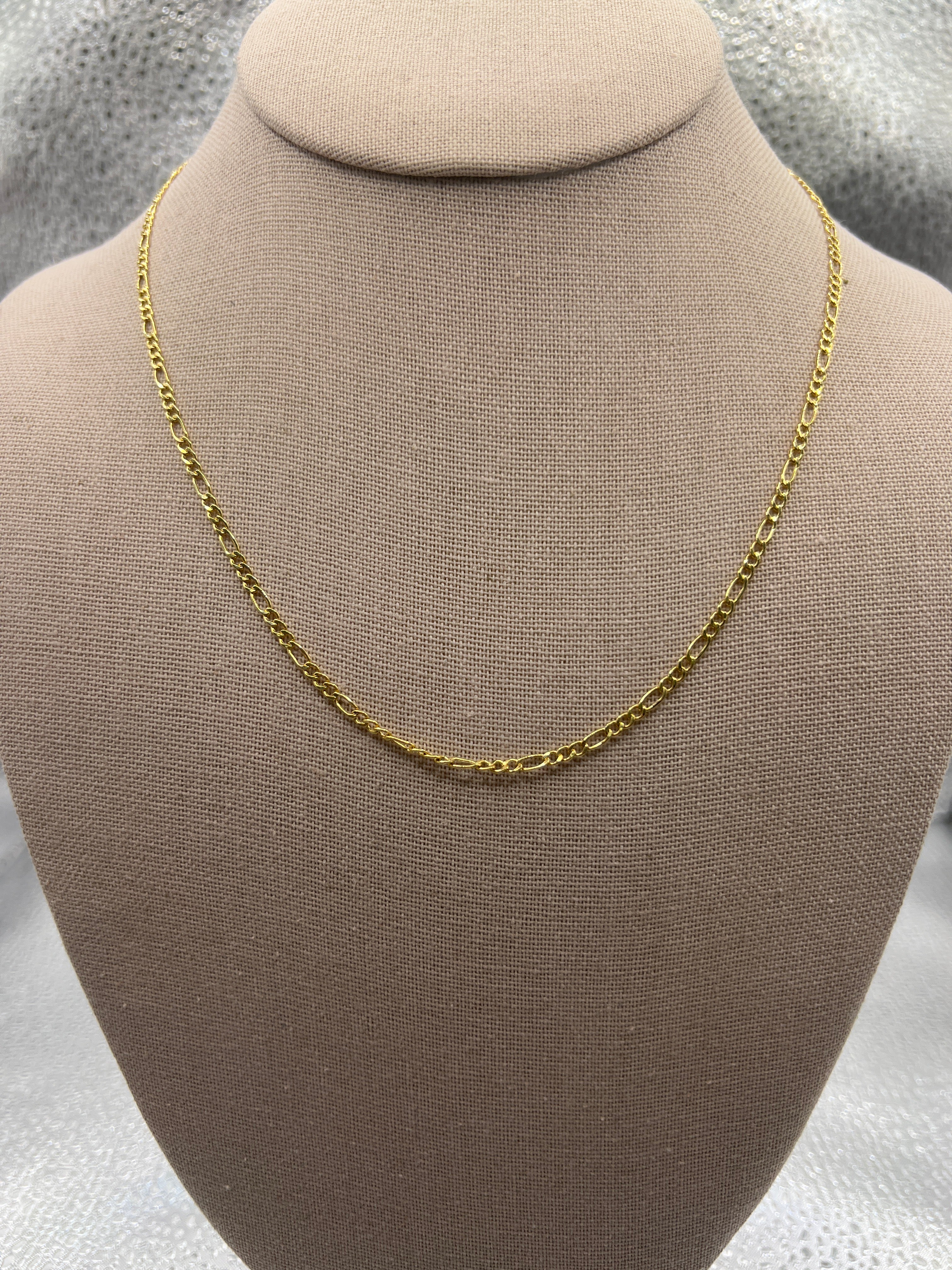 Cadena figaro de oro amarillo de 10k "18" 2.5mm