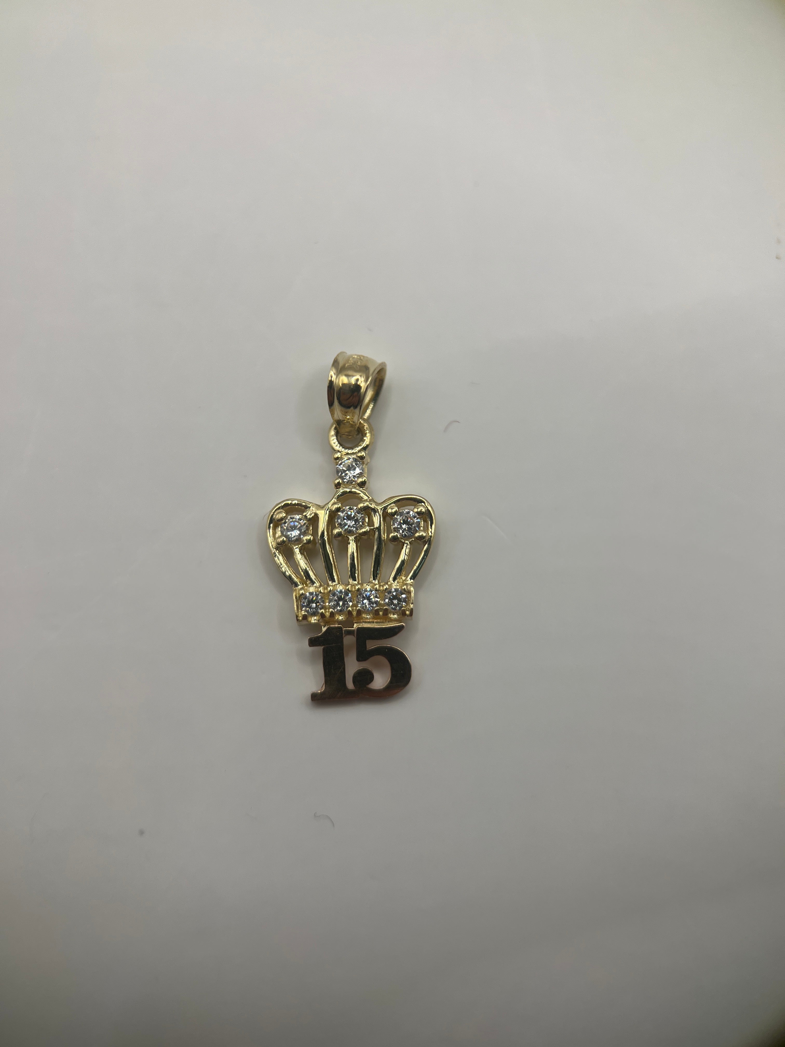 14k yellow gold 15th birthday pendant with crown