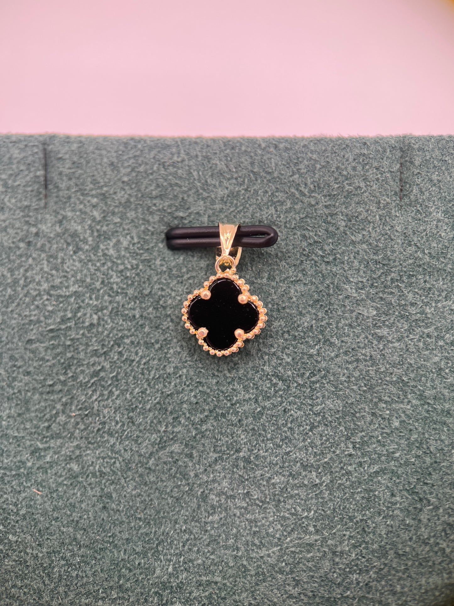 14k yellow gold black flower pendant