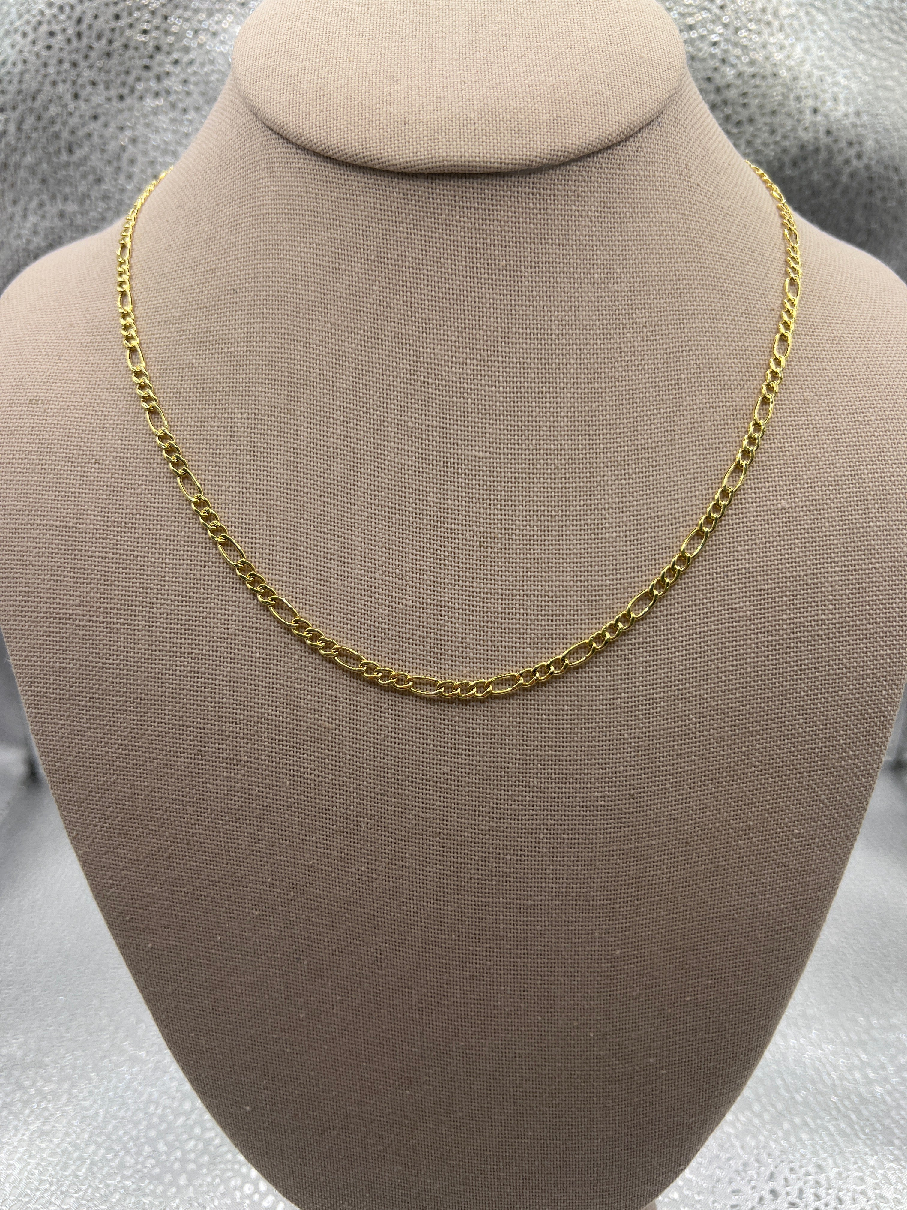 10k yellow gold figaro chain “18” 3.5mm