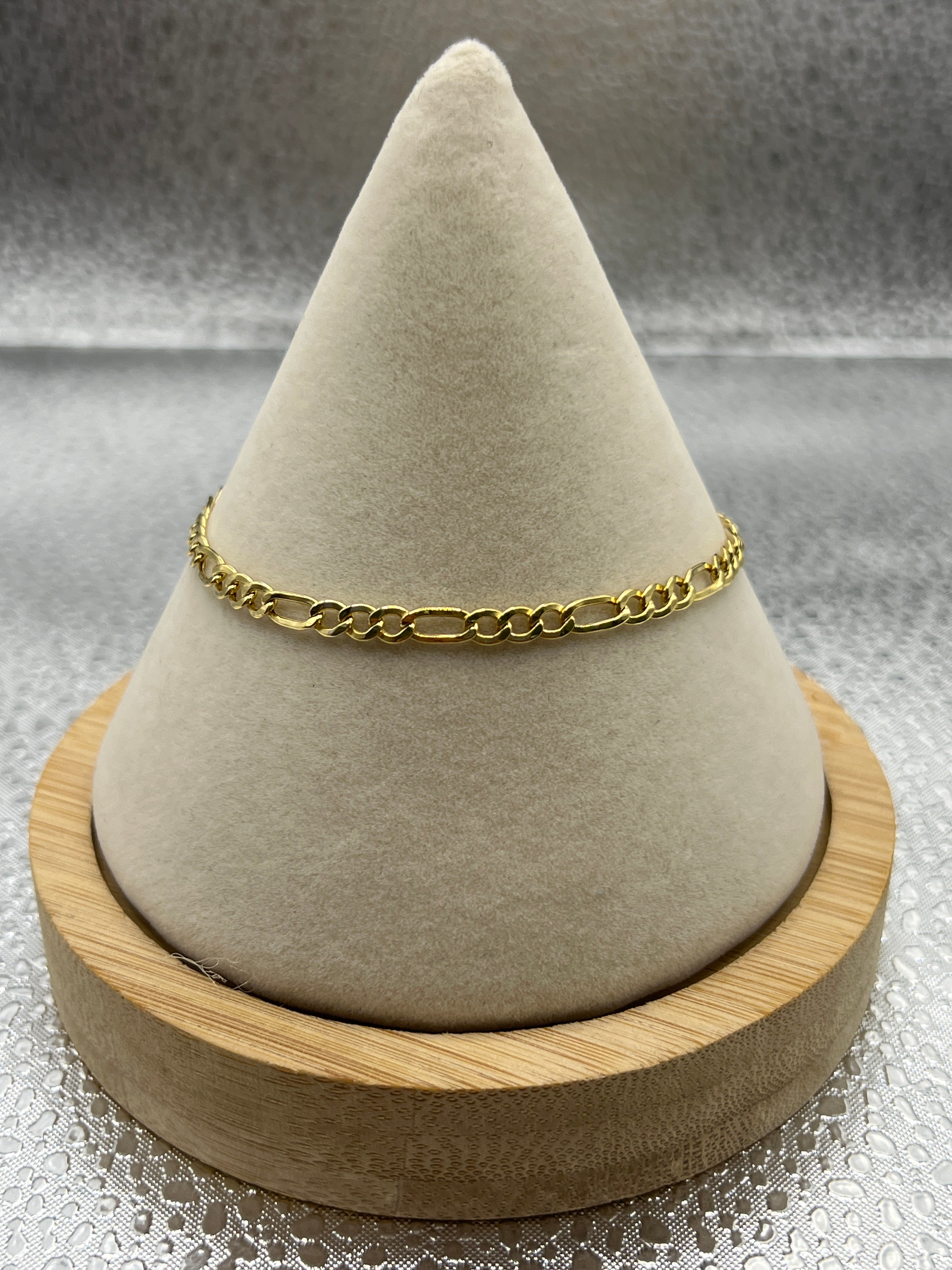 10k yellow gold figaro bracelet “7” 3.5mm